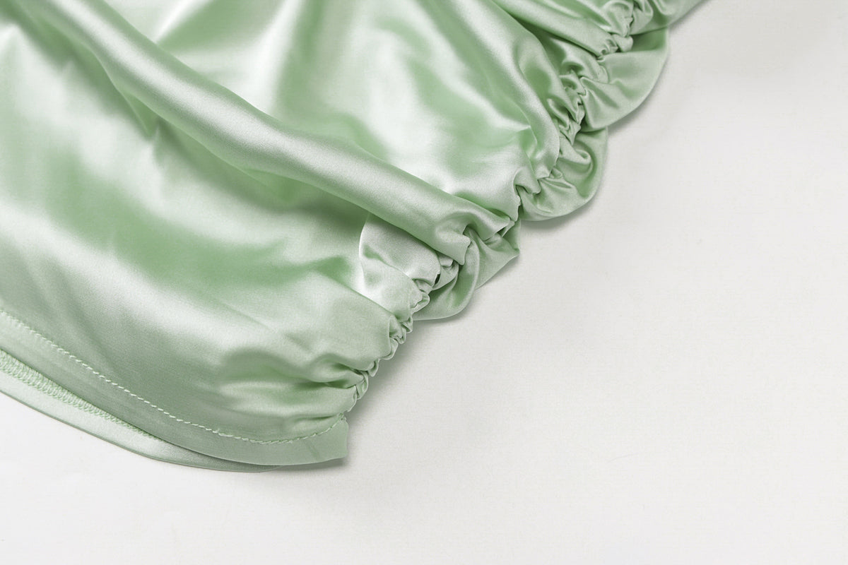 Robe satin vert sauge